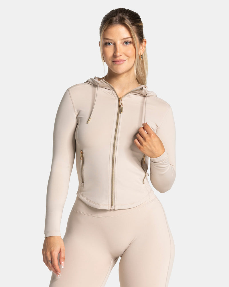 Veste de sport zippée sculptante à capuche Allrounder « Cream/Gold »